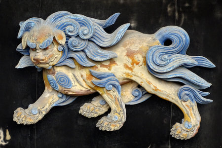 Kyoto, Japan - October 7, 2017: Lion bas-relief, detail of the karamon gate of Nishi Hongan-ji temple, one of six such a structures, designated as a National Treasure and a UNESCO World Heritage Site.のeditorial素材