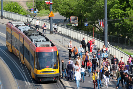 Warsaw, Poland - May 1, 2019: Tram in Polish capital Warsaw is the popular mode of public transportation.のeditorial素材