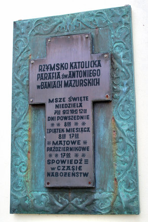 Banie Mazurskie, Poland - May 4, 2019: Sign on St. Antoni Padewski parish church, a former Evangelical and now a Catholic church, originally built in 1566.のeditorial素材