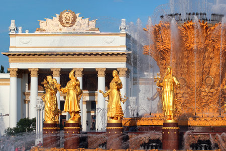 Moscow, Russia - June 23, 2019: The Friendship of Nations fountain at VDNKh, the Exhibition of Achievements of National Economy. 16 golden sculptures represent republics of the Soviet Union.のeditorial素材