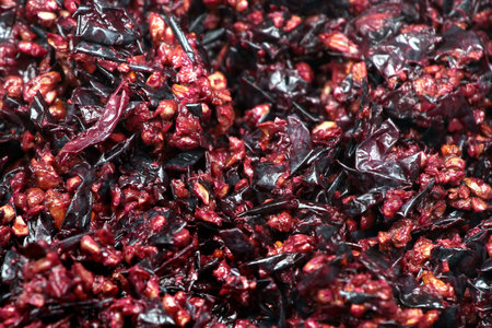 Pressed grape pomace, seeds and skins. Winemaking background.