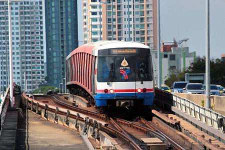 Bangkok, Thailand - December 1, 2019: Train approaching Saphan Taksin station on Silom line of...