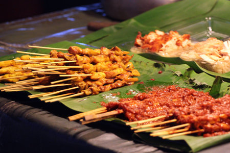 Thai street food at outdoor night market in Bangkok, Thailand. 