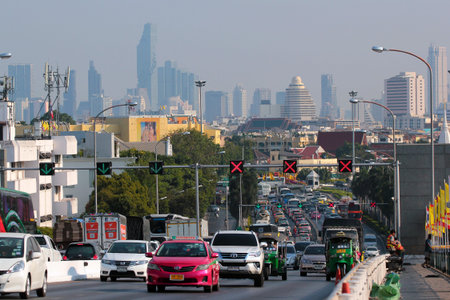 Bangkok, Thailand - December 13, 2019: Traffic jam on Phra Pinklao Bridge over Chao Phraya River in...