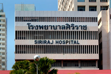 Bangkok, Thailand - December 14, 2019: Siriraj Hospital, the oldest and largest hospital in Thailand, as viewed from the Chao Phraya River.のeditorial素材