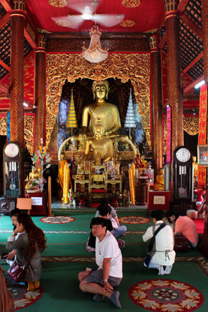 Chiang Mai, Thailand - December 3, 2019: Wat Chai Mongkhon, an old Buddhist temple in Chiang Mai, located by the Ping River, on Charoen Prathet Road in the old city center.のeditorial素材