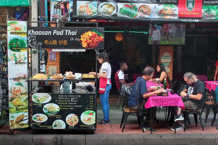Bangkok, Thailand - December 13, 2019: Khao San Road in central Bangkok, widely known as a world-famous backpacker ghetto with cheap hotels and night markets.のeditorial素材