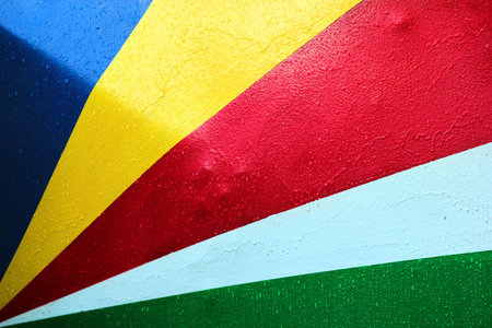 Flag of Seychelles Islands on wet metal wall