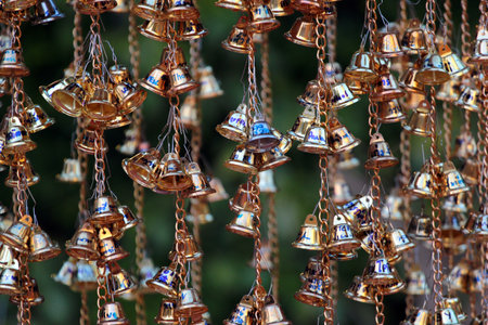 Chiang Mai, Thailand - December 3, 2019: Bells at Wat Phra Singh, a famous Buddhist temple in the old city center of Chiang Mai.のeditorial素材
