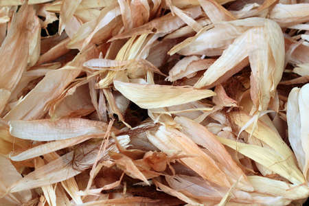 Dried corn leaves and husk as backgroundの写真素材