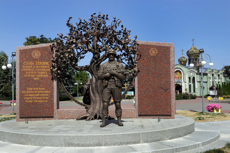 Cherkasy, Ukraine - August 15, 2021: Monument to heroes who died for the independence of Ukraine in the Russian-Ukrainian war, designed by the daughter of a soldier killed in the Eastern front.のeditorial素材