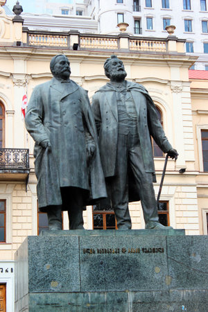 Tbilisi, Georgia - April 30,2017: Akaki Tsereteli and Ilia Chavchavadze monument in front of the first experimental public school and classic gymnasium in Tbilisiのeditorial素材