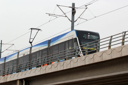 Antalya, Turkey - April 3, 2022: Hyundai Rotem tram arriving at the Airport station. International...