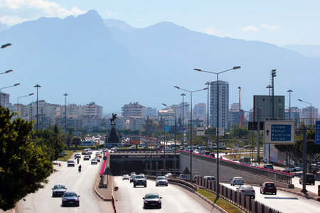 Antalya, Turkey - May 13, 2022: View of Konyaalti district of Antalya, with Ataturk monument, world-famous beaches and mountains in background.のeditorial素材