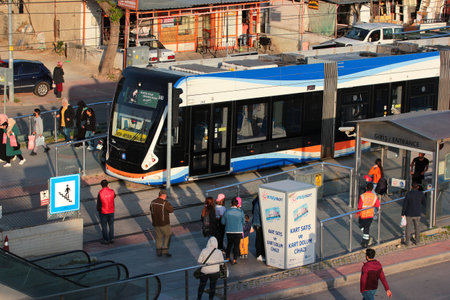 Antalya, Turkey - April 15, 2022: Antray light tram, a popular mode of transportation in Antalya, stands at Fatih station in Kepez district.のeditorial素材