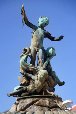 Sokolov, Czech Republic - August 10, 2023: Sculpture in the fountain on the Market Square in center of Sokolov, a town in the Karlovy Vary Region of the Czech Republic.のeditorial素材