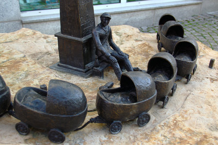 Zeitz, Germany - September 20, 2024: Sculpture of Ernst Albert Naether, a Zeitz-born entrepreneur and pioneer in the baby carriage industry.のeditorial素材