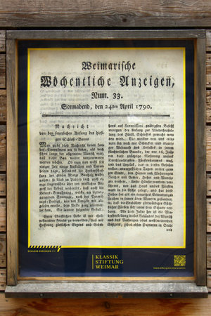 Weimar, Germany - April 7, 2024: Reproduction of a 1790 city newspaper announcing the reconstruction of the princely castle, destroyed by a devastating fire 16 years earlier.のeditorial素材
