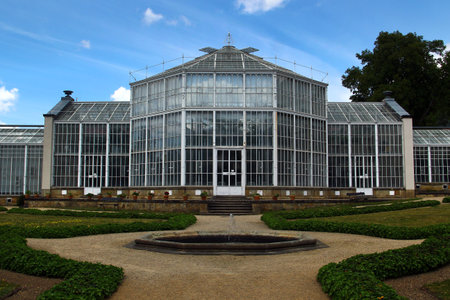 Orangery glasshouse with formal garden and central fountain in Pillnitz near Dresden, Germanyの写真素材