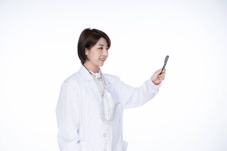 a pretty young female doctorの写真素材