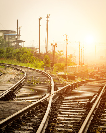 Cargo train platform at sunset with containerの写真素材