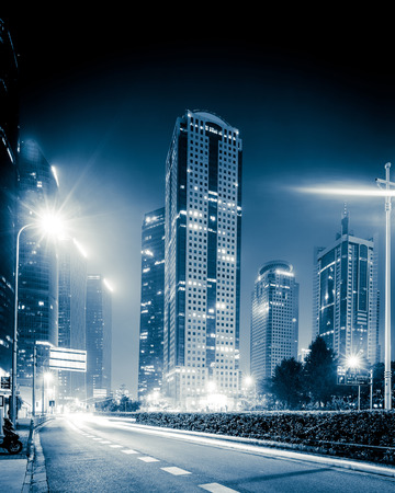 the light trails on the modern building background in shanghai china.の写真素材