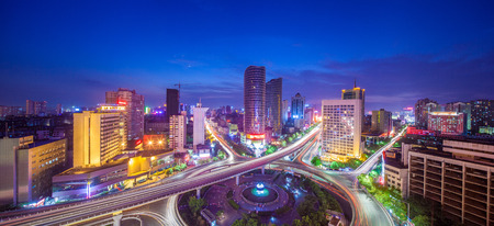 night view of the bridge and city in shanghai china.の写真素材