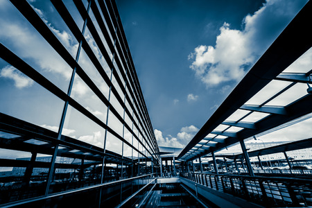 image of windows in morden office buildingの写真素材