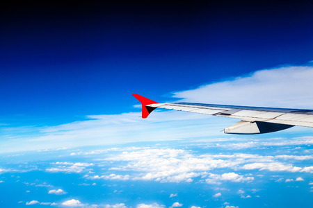 Classic image through aircraft window onto jet engineの写真素材