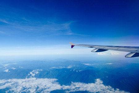 Classic image through aircraft window onto jet engineの写真素材