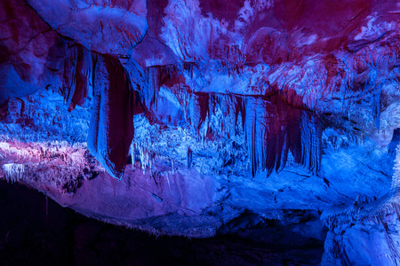 Stalactites and stalagmites in caveの写真素材