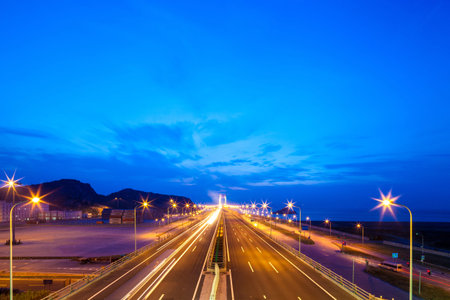 Highway at night in long exposureの写真素材