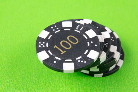 casino chips on the green tableの写真素材