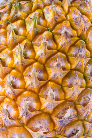 Close up texture of fresh ripe pineapple backgroundの写真素材