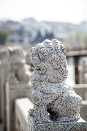 ancient vivid stone lion on the bridge in beijing,Chinaの写真素材