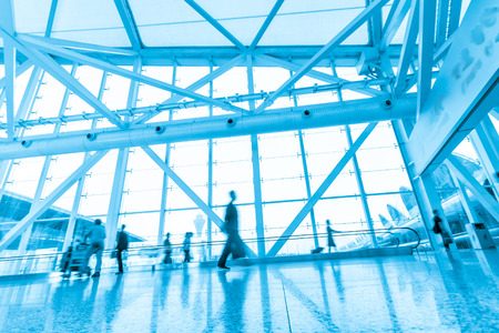 Futuristic guangzhou Airport interior people walking in motion blurのeditorial素材
