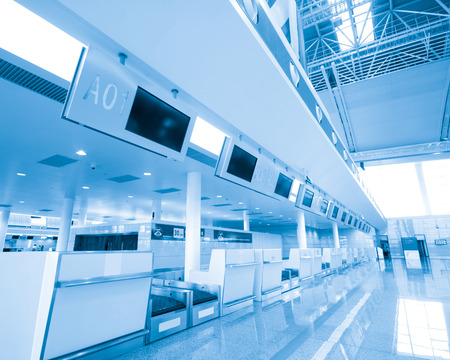 Modern interior of famous  International Airport. Security control machines and departures area.のeditorial素材
