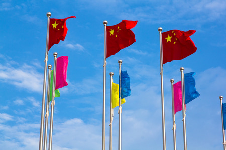 Flying under the banner of blue colorの写真素材