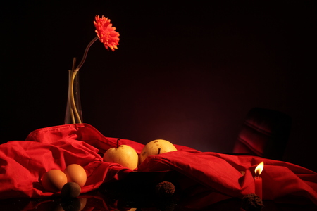 Pear, eggs ,flowers and red silkの写真素材