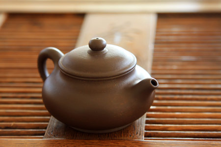 china violet arenaceous kettle, closeup of photo の写真素材