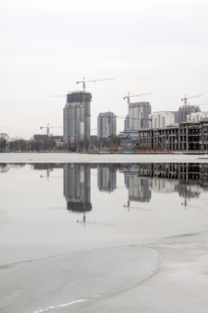 unfinished building at the side of riverの写真素材