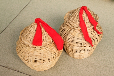 wicker weaving crafts in a marketの写真素材