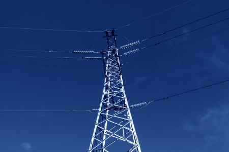 electric tower in the blue sky, steel power transmission facilitiesの写真素材