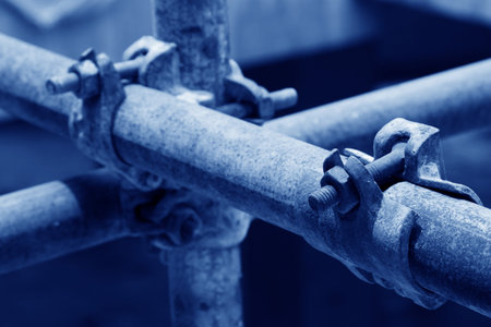rusty metal scaffolding elements, closeup of photo 