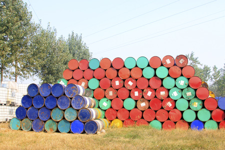 oil drums stacked together in a yard, north chinaのeditorial素材