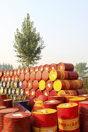 oil drums stacked together in a yard, north chinaのeditorial素材