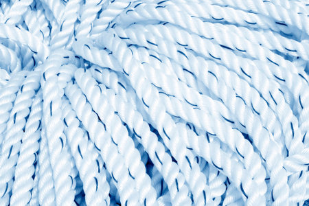 White nylon tape rolls in a shop, closeup of photo