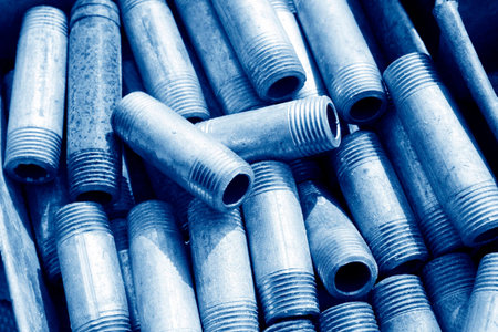 short metal pipes with external thread, closeup of photoの写真素材