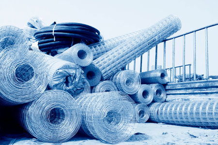 iron wire fence texture in a warehouse, closeup of photoの写真素材