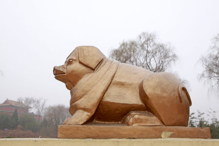 CANGZHOU - DECEMBER 8: The stone carving pig in the WuQiao acrobatics world scenic spots, on december 8, 2013, cangzhou, hebei province, China. のeditorial素材